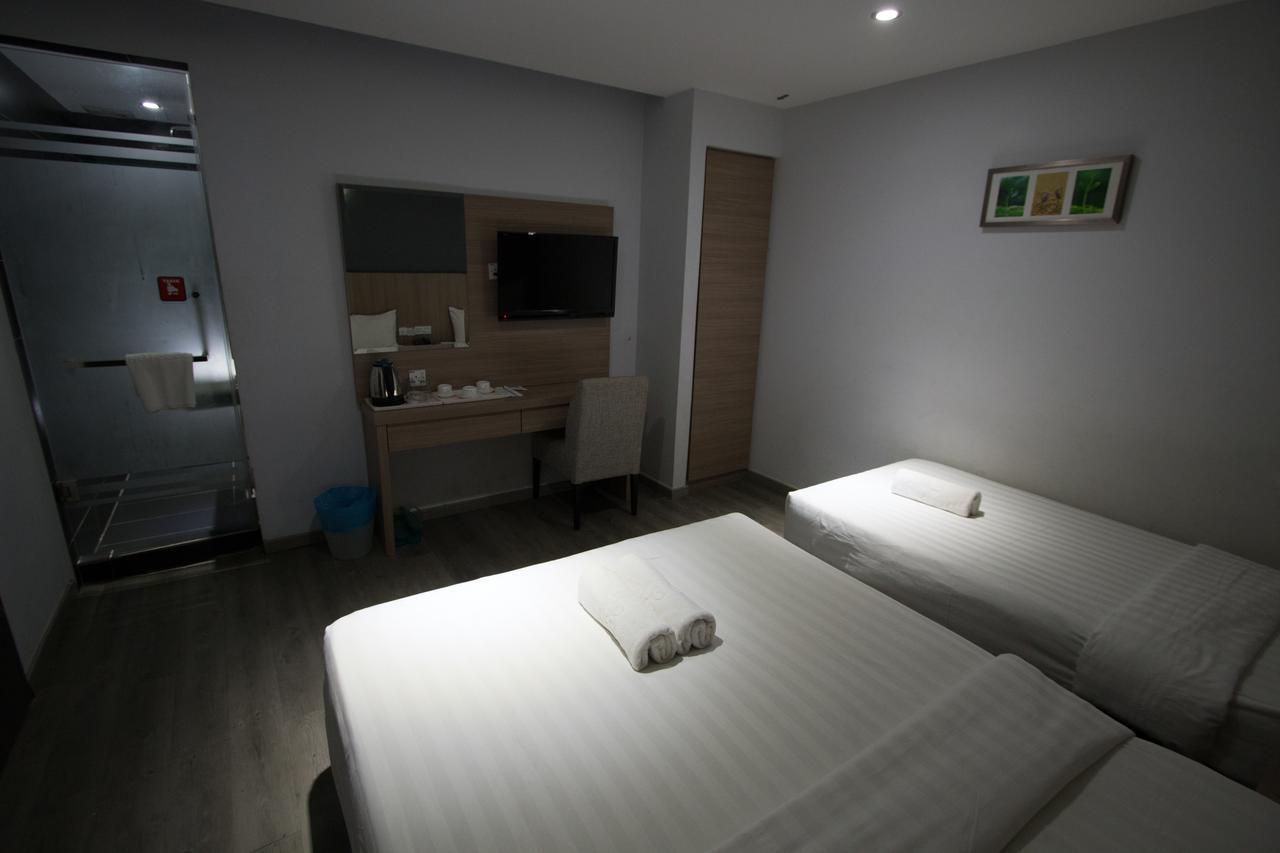 Hotel 99 Pusat Bandar ปูชอง ภายนอก รูปภาพ