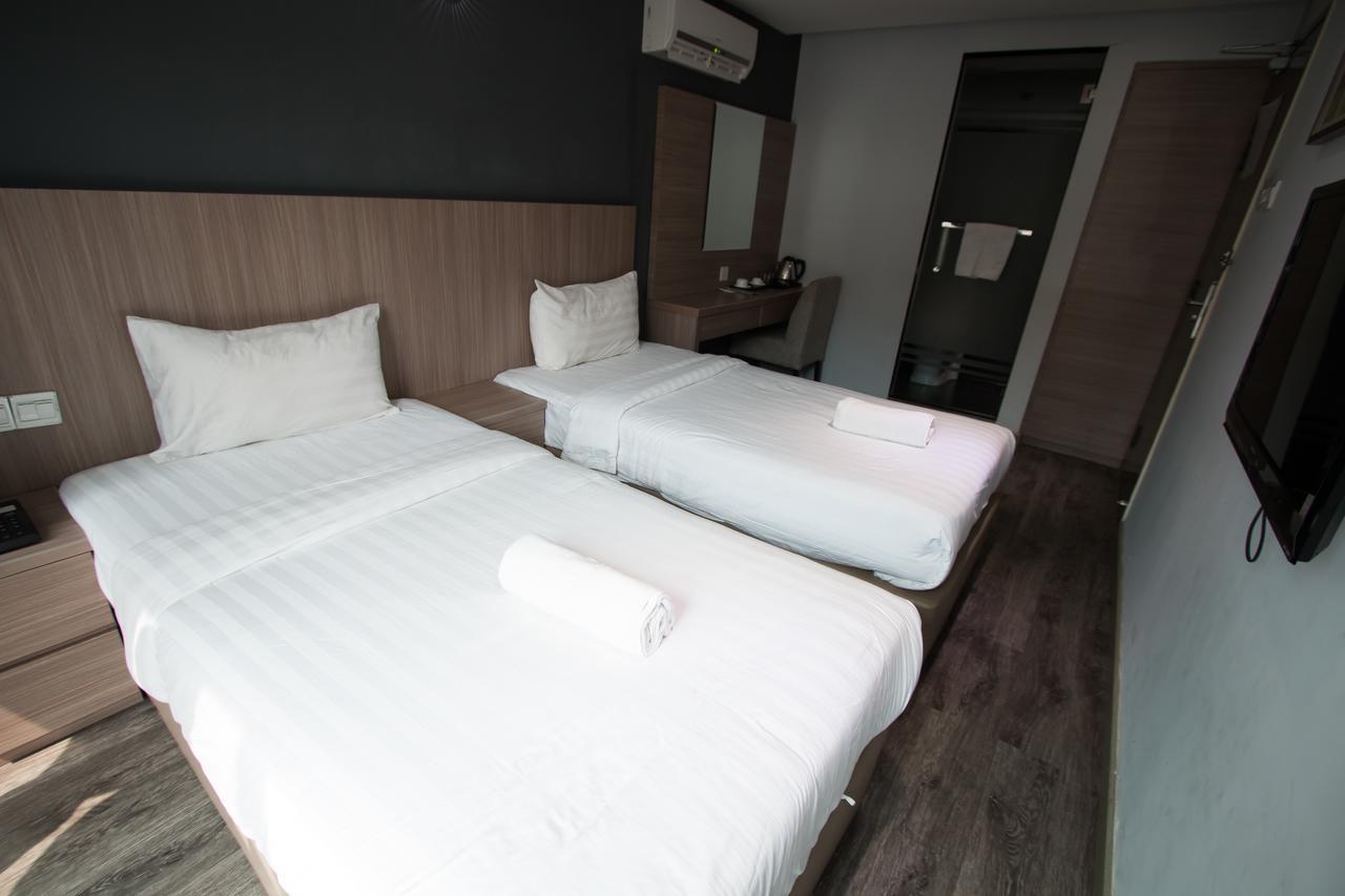Hotel 99 Pusat Bandar ปูชอง ภายนอก รูปภาพ