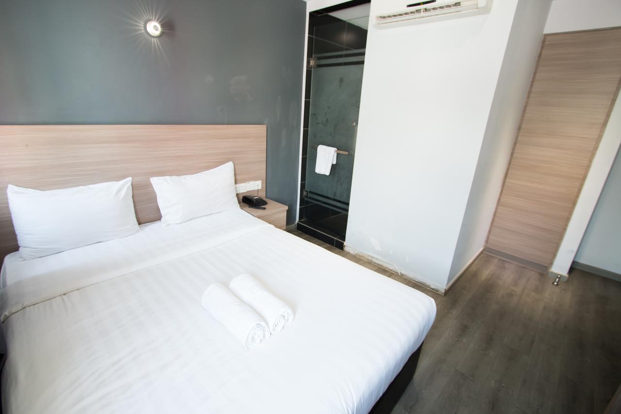 Hotel 99 Pusat Bandar ปูชอง ภายนอก รูปภาพ