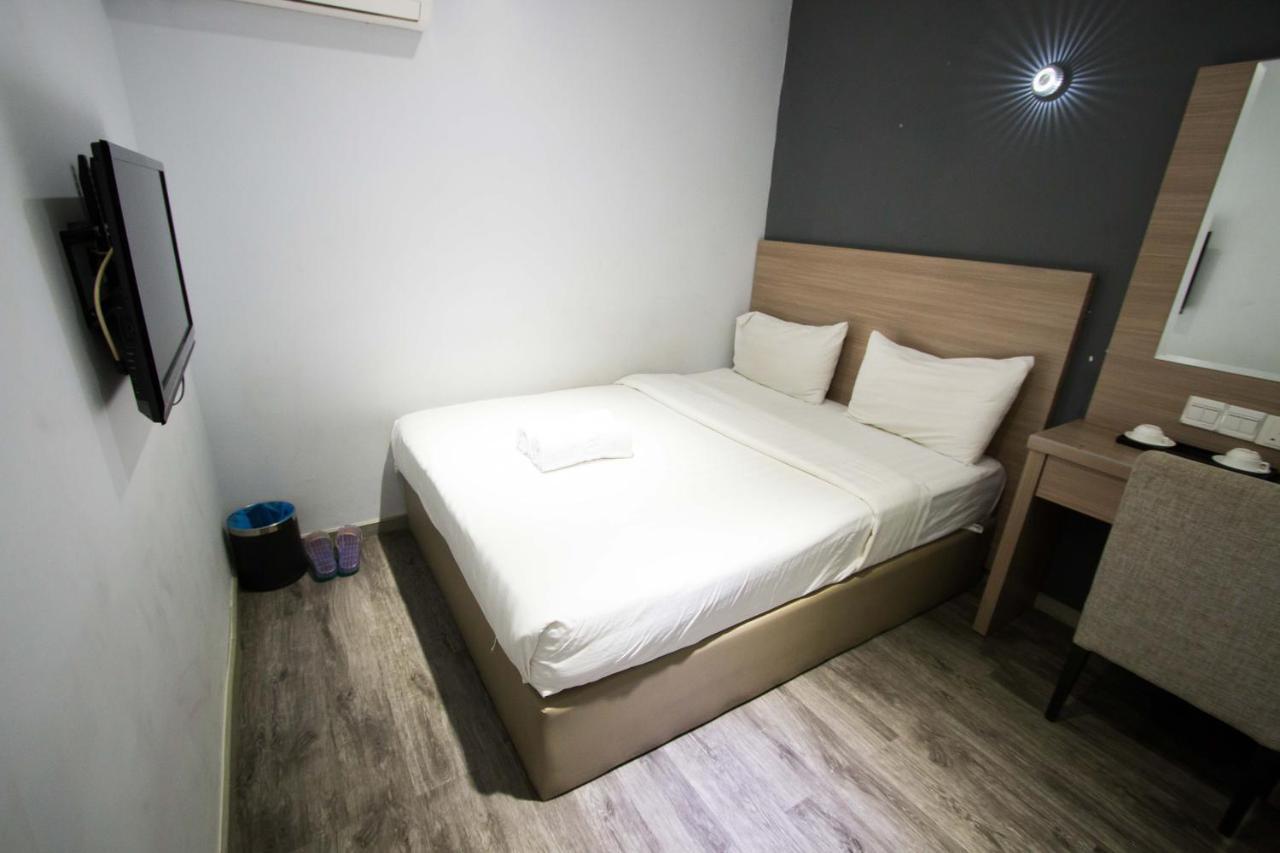 Hotel 99 Pusat Bandar ปูชอง ภายนอก รูปภาพ