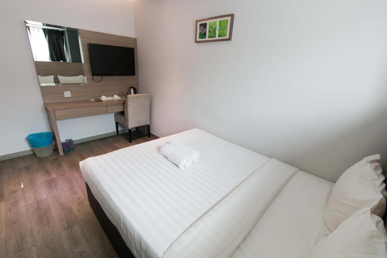 Hotel 99 Pusat Bandar ปูชอง ภายนอก รูปภาพ