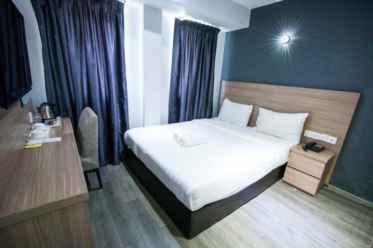 Hotel 99 Pusat Bandar ปูชอง ภายนอก รูปภาพ