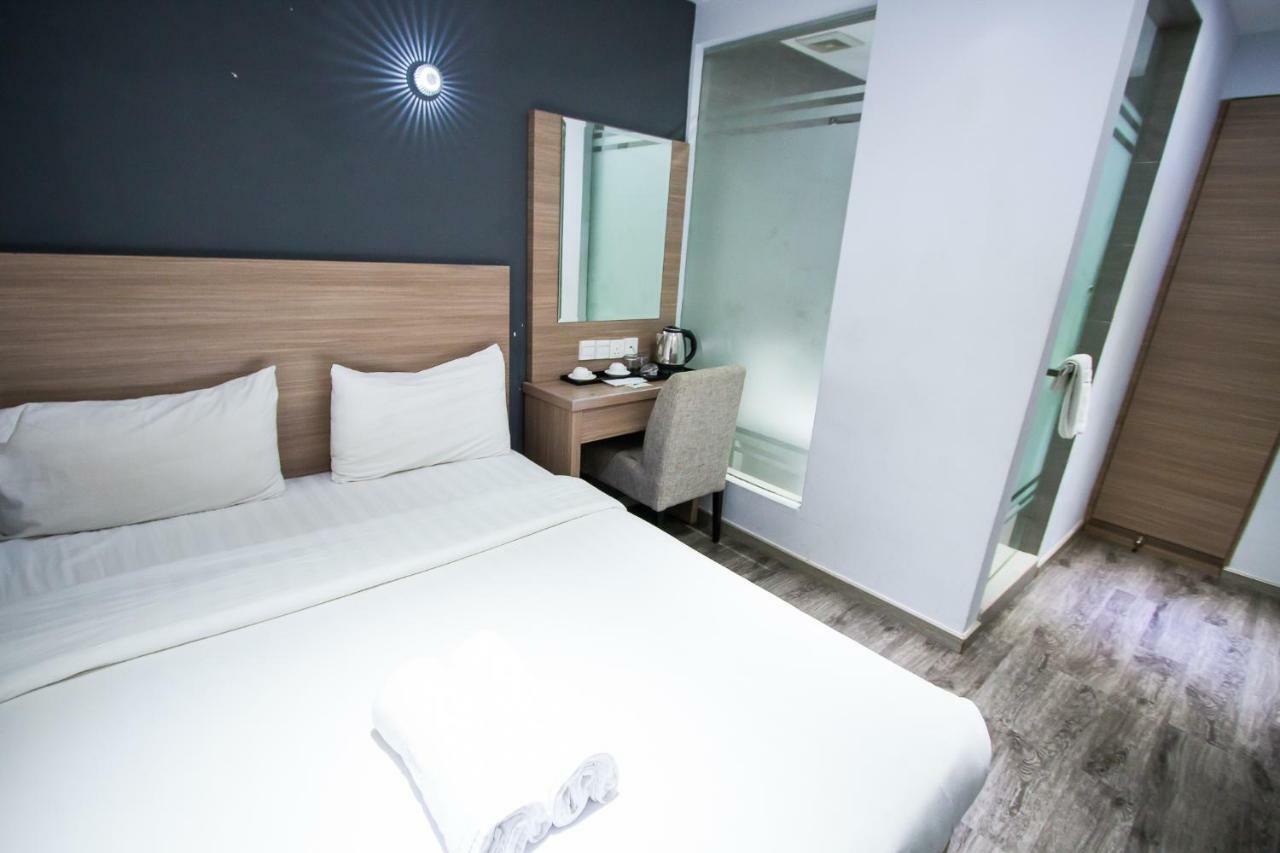 Hotel 99 Pusat Bandar ปูชอง ภายนอก รูปภาพ
