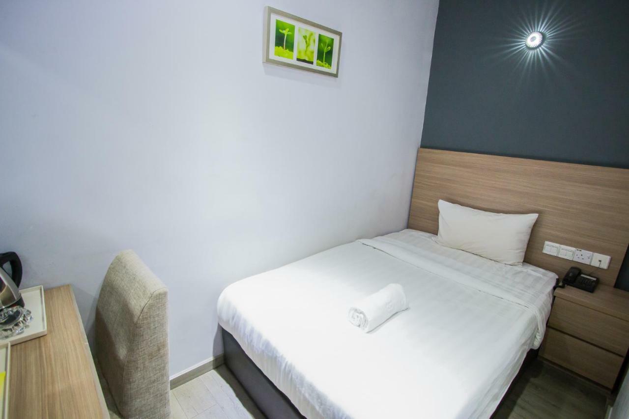 Hotel 99 Pusat Bandar ปูชอง ภายนอก รูปภาพ